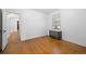 Clean bedroom features wood floors, and a window with air conditioning unit at 346 N Corona St, Denver, CO 80218