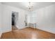 Bright living room with wood floors, white walls, and classic chandelier at 346 N Corona St, Denver, CO 80218
