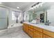 Bright bathroom featuring a soaking tub, double vanity, and a separate shower at 2225 Clayton Cir, Superior, CO 80027