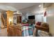 Spacious basement living room with comfortable seating, a large TV, and a cozy fireplace at 2225 Clayton Cir, Superior, CO 80027