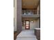 Contemporary townhome entrance featuring a red door, brick accents, and sleek design at 22 Oneida Ct, Denver, CO 80230