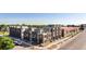 Modern townhome exteriors showcase a contemporary design and well-manicured landscaping at 22 Oneida Ct, Denver, CO 80230