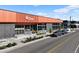 Charming retail space exterior with modern design, well-manicured landscaping, and street parking at 22 Oneida Ct, Denver, CO 80230