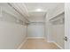 Large walk-in closet with ample shelving and hanging space at 4200 W 17Th Ave # 49, Denver, CO 80204