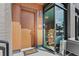 Modern entryway with wood and stone accents, welcoming you into this beautiful home at 4200 W 17Th Ave # 49, Denver, CO 80204