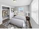 Serene bedroom with neutral tones, plush bedding, and ample natural light, creating a relaxing retreat for rest and rejuvenation at 795 Moline St, Aurora, CO 80010