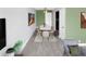 Cozy dining area showcasing a modern table with seating for six, complemented by stylish decor and ample natural light at 795 Moline St, Aurora, CO 80010