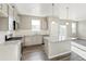 Stylish kitchen features stainless steel appliances, granite countertops, and a central island at 18029 Dandy Brush Ln, Parker, CO 80134