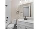 Clean bathroom featuring white vanity, modern fixtures, and a bathtub with shower at 10150 E Virginia Ave # 104, Denver, CO 80247