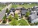 An aerial view showcases the home nestled in a neighborhood close to community green spaces at 5080 Uinta St, Denver, CO 80238