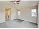 Bright bedroom with soft carpet, and two windows bringing in lots of natural light at 5080 Uinta St, Denver, CO 80238