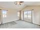 Airy carpeted bedroom with large windows and a ceiling fan at 5080 Uinta St, Denver, CO 80238