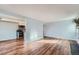 Open-concept living space with seamless flow into the kitchen, perfect for entertaining and modern living at 17652 E Loyola Dr # 2032R, Aurora, CO 80013