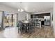 Bright dining area provides seamless access to the kitchen and the backyard at 603 Jewel St, Brighton, CO 80603