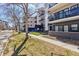 Beautiful building exterior featuring balconies, well-maintained landscaping, and a inviting entrance at 345 Fillmore St # 203, Denver, CO 80206