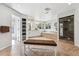 Bright and spacious primary bathroom with double vanity, large windows and walk in shower at 2615 Oak Dr # 7, Lakewood, CO 80215