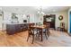 Bright dining room features a wood table, decorative chairs, and built in wood cabinet at 2615 Oak Dr # 7, Lakewood, CO 80215