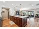 Modern kitchen featuring a large island with a prep sink and stainless steel appliances at 2615 Oak Dr # 7, Lakewood, CO 80215