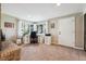 Office space with a neutral color palette, brick fireplace, and large windows for a bright, productive workspace at 2615 Oak Dr # 7, Lakewood, CO 80215
