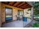 Back patio with brick base, fenced yard and sitting area perfect for relaxation at 2615 Oak Dr # 7, Lakewood, CO 80215