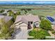 Spacious home with a three-car garage, manicured lawn, landscaping, and an amazing mountain view at 4965 Bierstadt Loop, Broomfield, CO 80023