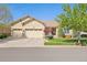 Charming home with a well-manicured lawn and a three-car garage enhancing curb appeal at 4965 Bierstadt Loop, Broomfield, CO 80023