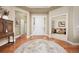 Bright foyer featuring beautiful hardwood floors and an inviting atmosphere at 4965 Bierstadt Loop, Broomfield, CO 80023
