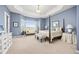 Spacious main bedroom boasts a bay window with bench seating, four-poster bed, and en-suite bathroom at 4965 Bierstadt Loop, Broomfield, CO 80023