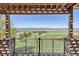 The gorgeous views from the covered patio feature mountains, fields and beautiful blue skies at 4965 Bierstadt Loop, Broomfield, CO 80023