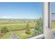 Vast mountain views from bedroom window showcase the property's desirable location and serene surroundings at 4965 Bierstadt Loop, Broomfield, CO 80023