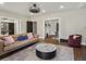 Spacious living room featuring hardwood floors, recessed lighting, and a comfortable seating area at 4495 Utica St, Denver, CO 80212