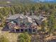 An elevated home with a wrap around deck and gazebo to enjoy nature at 2817 Keystone Dr, Evergreen, CO 80439