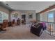 Cozy sitting area with comfortable chairs, desk, and a view of the outside at 2817 Keystone Dr, Evergreen, CO 80439
