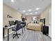 Finished basement bedroom with desk area, comfortable queen bed, and closet at 8646 Fawnwood Dr, Castle Pines, CO 80108