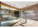 Elegant building entrance with glass doors and marble accents at 1299 N Gilpin St # 10W, Denver, CO 80218