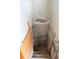 Interior stairway featuring railing and access to the upper floors at 1445 Saint Paul St, Denver, CO 80206