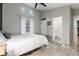 A sun filled bedroom features a full bed, closet and ensuite bathroom at 302 Texas Dr, Idaho Springs, CO 80452