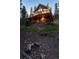 Inviting home with multi-level decks, perfect for enjoying the surrounding natural beauty at 302 Texas Dr, Idaho Springs, CO 80452