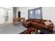 Cozy living room featuring a foosball table, comfortable seating, and access to other rooms at 302 Texas Dr, Idaho Springs, CO 80452