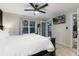 This bedroom provides a comfortable king bed, ceiling fan, and outdoor access at 302 Texas Dr, Idaho Springs, CO 80452