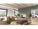 Spacious living room with fireplace and large windows at 12983 W Ida Ave # 300, Littleton, CO 80127