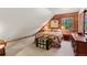 Upstairs bedroom with carpeted floor, and wood walls at 531 Mountain View Trl, Breckenridge, CO 80424