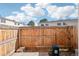 Fenced backyard featuring a well-maintained lawn and easy access to a playground at 8975 Field St # 39, Broomfield, CO 80021