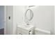 Updated bathroom with a vanity, sink, toilet, and mirror at 8975 Field St # 39, Broomfield, CO 80021