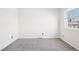 Neutral bedroom with carpet, window, and natural light streaming in the room at 8975 Field St # 39, Broomfield, CO 80021