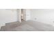 Bedroom showcasing neutral carpet, white walls, closet, and natural light at 8975 Field St # 39, Broomfield, CO 80021