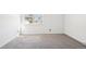 Neutral bedroom features carpet flooring and bright light at 8975 Field St # 39, Broomfield, CO 80021