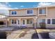 Attractive condo exterior featuring a covered entrance and designated parking at 8975 Field St # 39, Broomfield, CO 80021