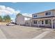 Condo exterior showcasing covered entryways, parking and tidy landscaping at 8975 Field St # 39, Broomfield, CO 80021