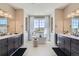 Bright bathroom with granite counters, soaking tub and mountain views at 8661 Hunters Hill Ln, Littleton, CO 80125